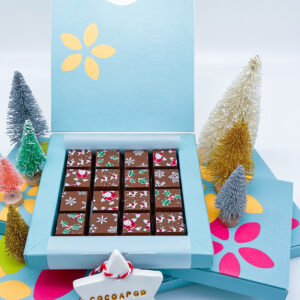 Square box of Christmas Santa Snowflake and Holly patterned Chocolate