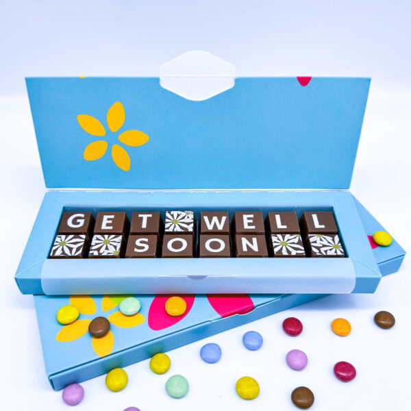 A box of solid milk chocolate blocks that spell out the message Get Well Soon.