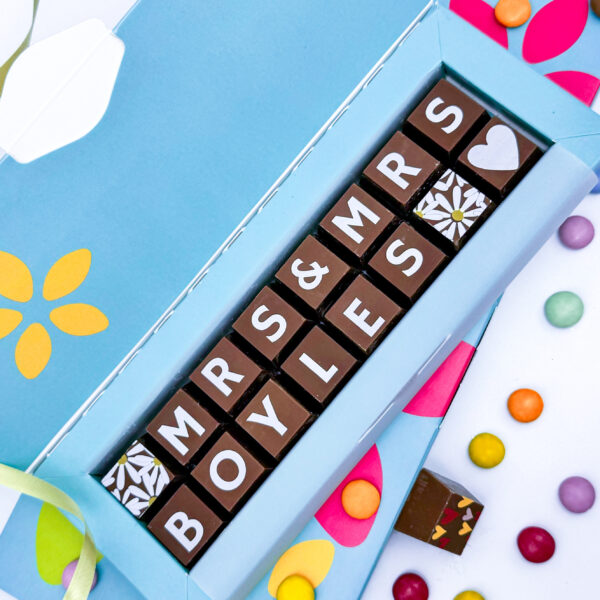 A box of solid milk chocolate with the message Mrs and Mrs Boyles spelled out in chocolate. This can be personalised for any happy couple.