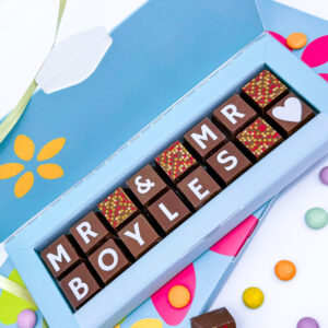 A box of solid milk chocolate with the message Mr and Mr Boyles spelled out in chocolate. This can be personalised for any happy couple.