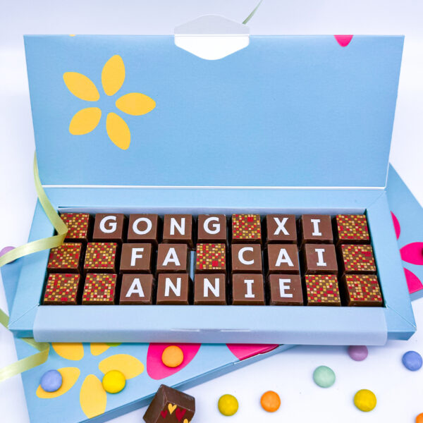 Personalised box of chocolates that read Gong Xi Fa Ca (Happy New Year)