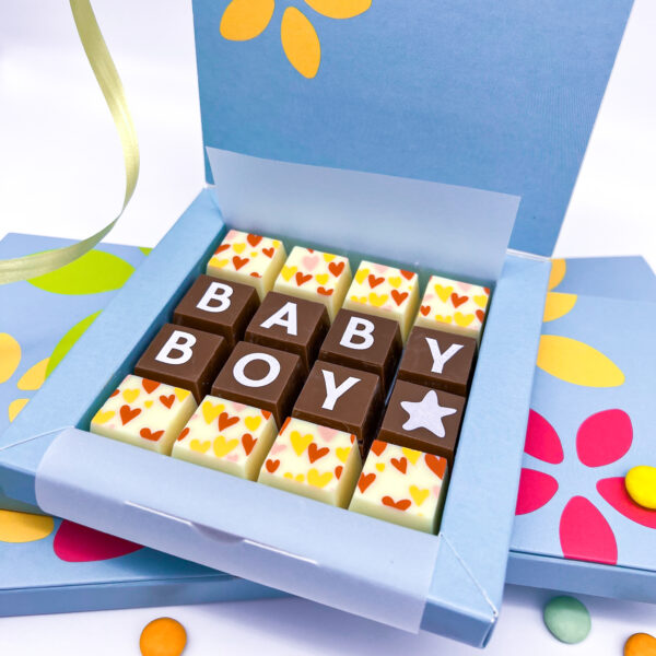 A box of solid milk and white chocolate blocks that spell out the words Baby Boy. Can be personalised for a boy or girl.